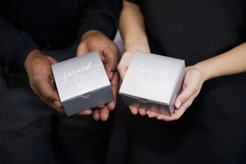 Hand-lettered favor boxes filled with treats for our fabulous team and their spouses!