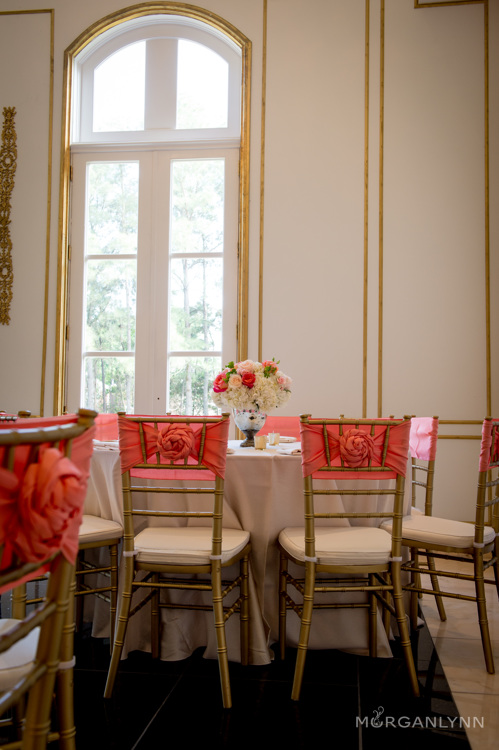 Subtle details such as a coral rossette chair tie from Aztec Events and Tents, make a huge difference!