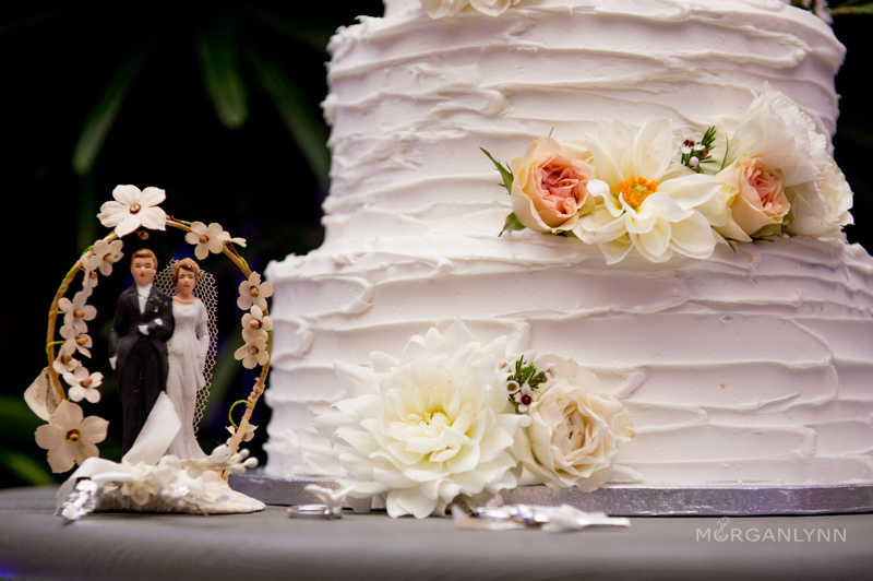 Simple but sweet buttercream cake by More than Cakes. Emily displayed her parents wedding topper as her something old.