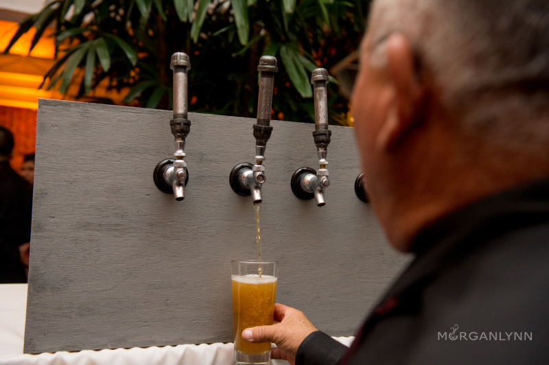 Hand crafts beer pulls by the Best Man with the couples names and wedding date. 