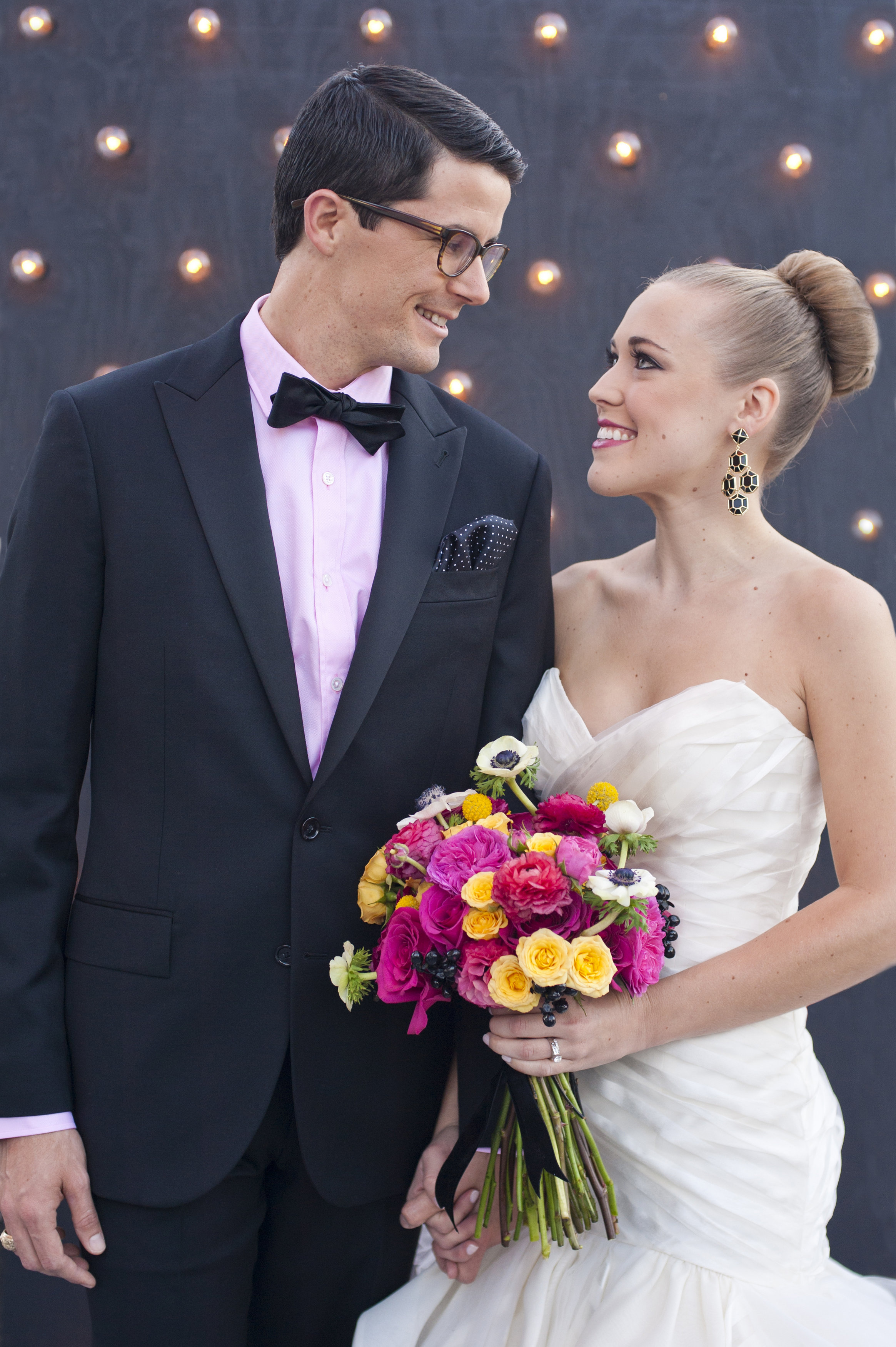 A classic American couple with a modern twist! Menswear from J. Crew Men's Shop; Keaton gown by Hayley Paige from Now and Forever Bridal Boutique, Jewelry by Kendra Scott, Hair and Make Up Artistry by Pink Palette Artists.